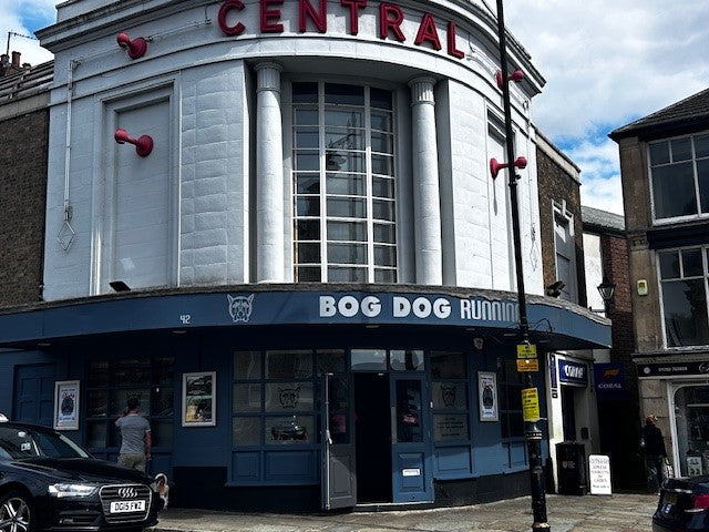 The Bog Dog Running shopfront at 42 Broad Street, Stamford — navy frontage in the old Central cinema building